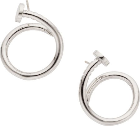 Aldo Cipullo Gold Earrings: Aldo Cipullo Gold Earrings From the Nail Collection, in 18k white gold.