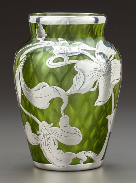 A STEUBEN GREEN QUILTED GLASS VASE WITH LA PIERR: A STEUBEN GREEN QUILTED GLASS VASE WITH LA PIERRE SILVER OVERLAY Steuben Glass, Corni