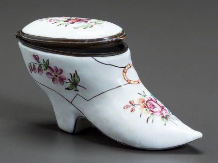 AN ENAMELED METAL SHOE-FORM SNUFF BOX Late 19th: AN ENAMELED METAL SHOE-FORM SNUFF BOX Late 19th century 2 inches high x 3-1/2 inch