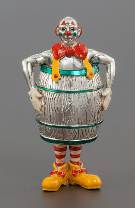 A TIFFANY & CO. SILVER AND ENAMEL CIRCUS CLOWN I: A TIFFANY & CO. SILVER AND ENAMEL CIRCUS CLOWN IN A BARREL DESIGNED BY GENE MOORE Tiffany &