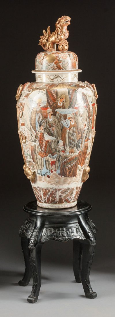 A JAPANESE SATSUMA CERAMIC COVERED URN ON CARVED: A JAPANESE SATSUMA CERAMIC COVERED URN ON CARVED EBONIZED WOOD STAND Late 19th century 4