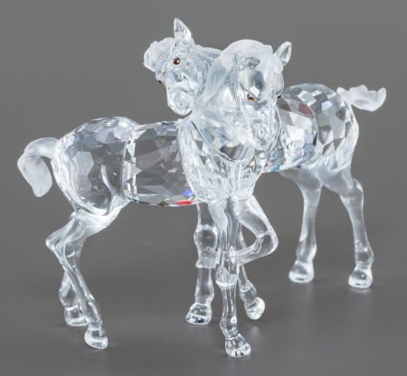 A SWAROVSKI CRYSTAL DOUBLE HORSE FIGURINE IN ORI: A SWAROVSKI CRYSTAL DOUBLE HORSE FIGURINE IN ORIGINAL BOXCirca 2000Marks: (swan), ©