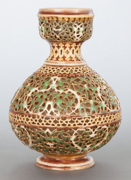 A ZSOLNAY PIERCED RETICULATED PORCELAIN VASE 20: A ZSOLNAY PIERCED RETICULATED PORCELAIN VASE 20th century Marks: ZSOLNAY, PECS,