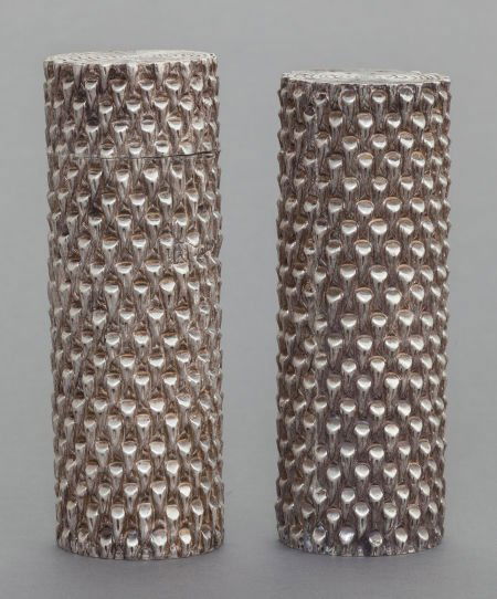 A JANNA THOMAS MEXICAN SILVER SALT SHAKER AND PE: A JANNA THOMAS MEXICAN SILVER SALT SHAKER AND PEPPER GRINDERJanna Thomas de Velarde, Taxco