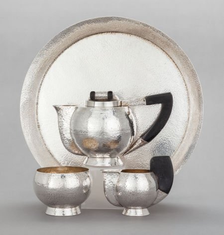 A FOUR PIECE AUSTRIAN SILVER AND EBONIZED WOOD T: A FOUR PIECE AUSTRIAN SILVER AND EBONIZED WOOD TEA SERVICE Maker unidentified, Austria, cir