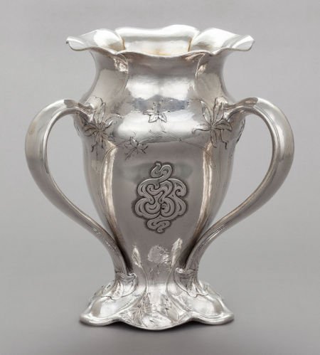 A GORHAM SILVER AND SILVER GILT MARTELÉ LOVING C: A GORHAM SILVER AND SILVER GILT MARTELÉ LOVING CUP Gorham Manufacturing Co., Providen