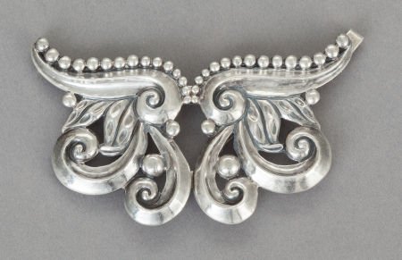 A MARGOT DE TAXCO MEXICAN SILVER BUCKLE CONVERTI: A MARGOT DE TAXCO MEXICAN SILVER BUCKLE CONVERTING TO TWO BROOCHES Margot Van Voorhies Carr