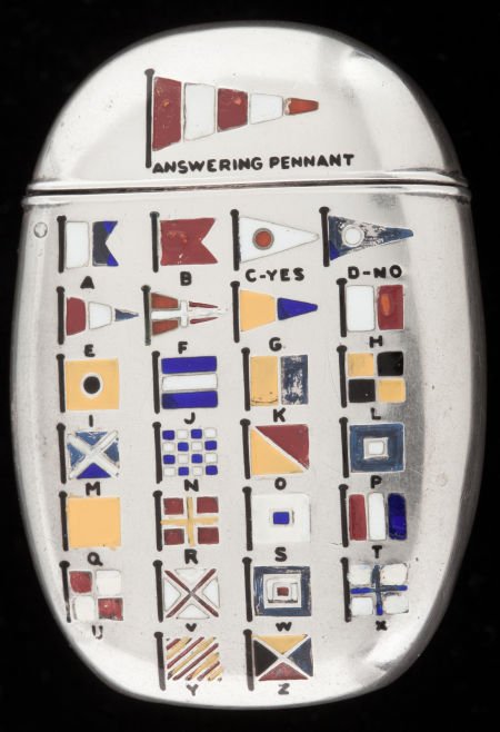 AN AMERICAN SILVER, SILVER GILT AND ENAMEL MATCH: AN AMERICAN SILVER, SILVER GILT AND ENAMEL MATCH SAFE Maker unknown, circa 1900 Ma