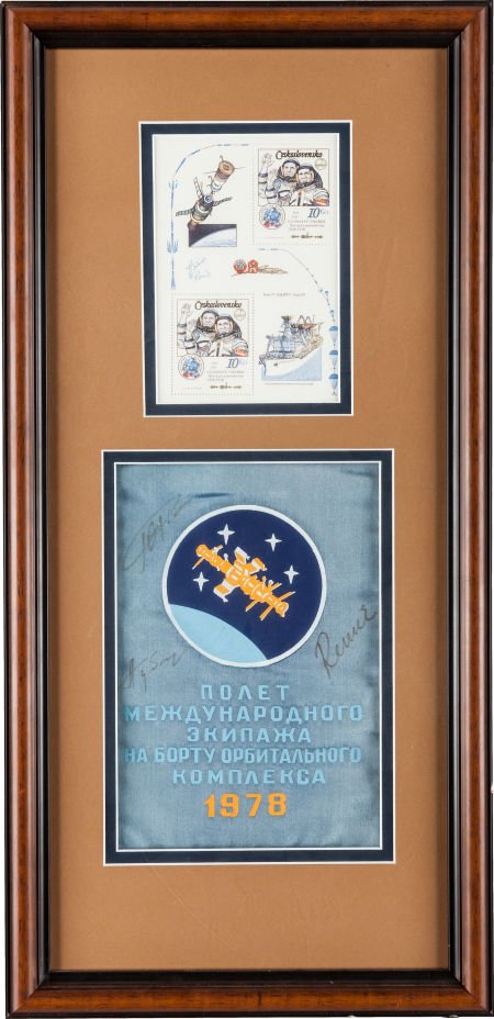 Soviet Soyuz 27 & 28 Signed Banner with Czech/ S: Soviet Soyuz 27 & 28 Signed Banner with Czech/ Soviet Flag and Czech Stamp Sheet in Framed Display.