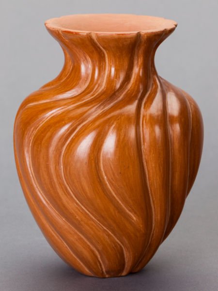 A SANTA CLARA BUFFWARE JAR Tammy Borts Garcia c.: A SANTA CLARA BUFFWARE JAR Tammy Borts Garcia c. 1980 decorated with a car