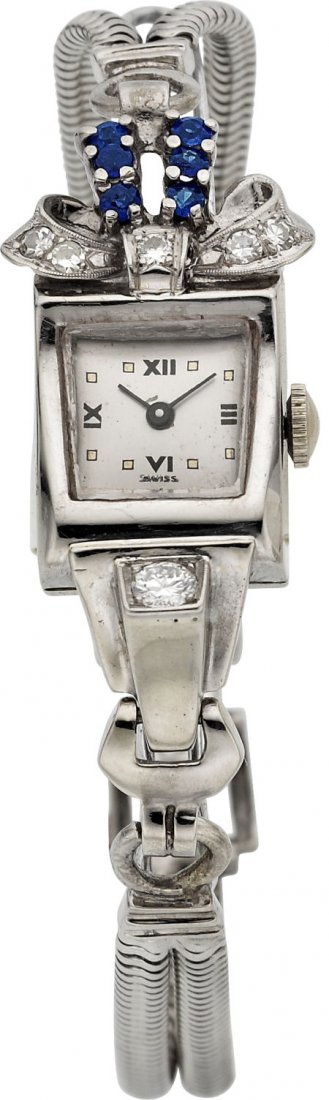 Swiss White Gold, Diamond & Sapphire Wristwatch,: Swiss White Gold, Diamond & Sapphire Wristwatch, circa 1940's Case: 14k white gold, 40 mm