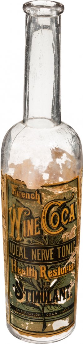 French Wine Coca Bottle with Original Paper Labe: French Wine Coca Bottle with Original Paper Labels. This bottle is a rare survivor from t