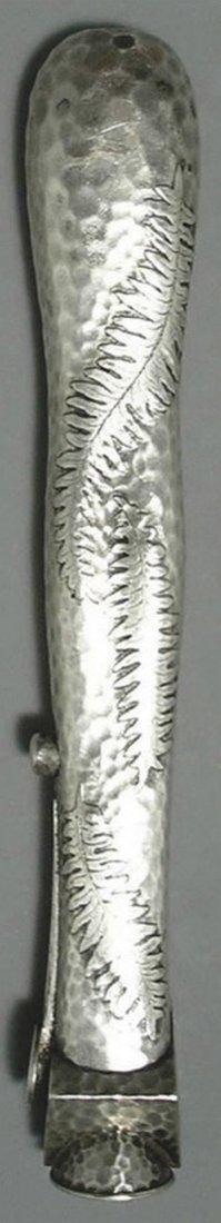 AN AMERICAN HAMMERED SILVER LAP-OVER-EDGE PATTER: AN AMERICAN HAMMERED SILVER LAP-OVER-EDGE PATTERN CIGAR CUTTER, Tiffany & Co., New York,