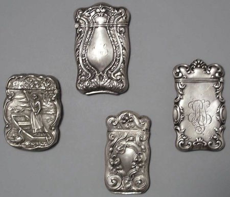 A GROUP OF FOUR AMERICAN SILVER MATCH SAFES, on: A GROUP OF FOUR AMERICAN SILVER MATCH SAFES, one by F.S. Gilbert, North Attleboro, Massachuse