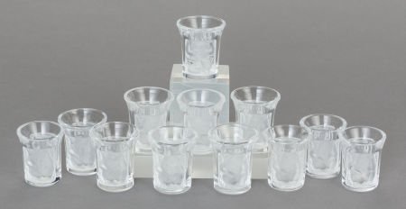 A SET OF TWELVE LALIQUE GLASS ENFANTS LIQUEUR GL: A SET OF TWELVE LALIQUE GLASS ENFANTS LIQUEUR GLASSES,&n