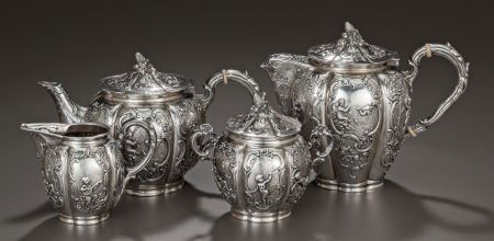 A FOUR PIECE SILVER-PLATED TEA SERVICE, Maker un: A FOUR PIECE SILVER-PLATED TEA SERVICE, Maker unidentified, 20th centuryMarks: S-S