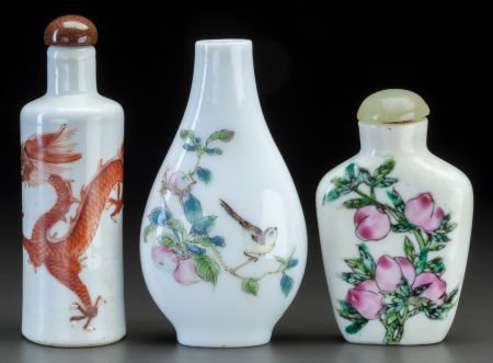 THREE CHINESE PORCELAIN SNUFF BOTTLES Marks: (ch: THREE CHINESE PORCELAIN SNUFF BOTTLES Marks: (chop marks) 3-1/4 inches high (8.3 cm) (dr