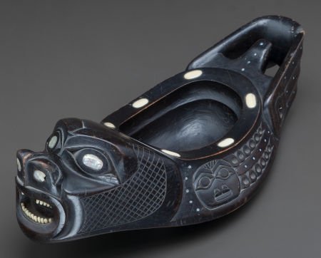 A NORTHWEST COAST CARVED WOOD EFFIGY BOWL c. 190: A NORTHWEST COAST CARVED WOOD EFFIGY BOWL c. 1900 wood, abalone shell, operculum shell,