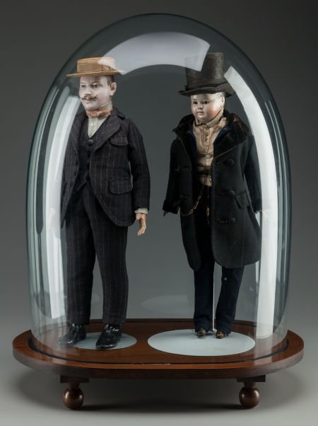 TWO VICTORIAN GENTLEMAN DOLLS UNDER A GLASS DOME (1 of 2)