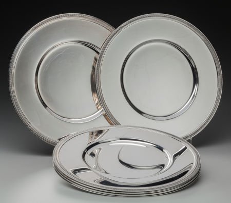 A SET OF NINE CHRISTOFLE SILVER-PLATE CHARGERS, (1 of 2)