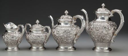 A FOUR PIECE KIRK & SON REPOUSSÉ PATTERN SILVER (1 of 2)
