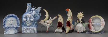 SEVEN GERMAN BISQUE MOON AND SUN FIGURINES, circ (1 of 2)