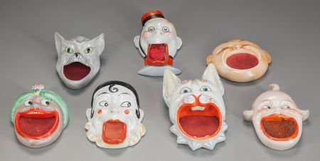 SEVEN GERMAN CERAMIC FIGURAL STAMP MOISTENERS, c (1 of 2)