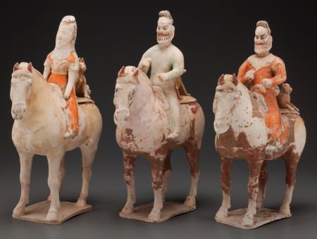 THREE CHINESE TANG-STYLE EARTHENWARE EQUESTRIAN : THREE CHINESE TANG-STYLE EARTHENWARE EQUESTRIAN FIGURES 17 x 15 x 4-1/2 inches (43.2 x 38.1