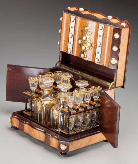 A French Maple and Mahogany Cave à Liqueur with: A French Maple and Mahogany Cave à Liqueur with Ivory and Gilt Bronze Mounts, 19th century 11-