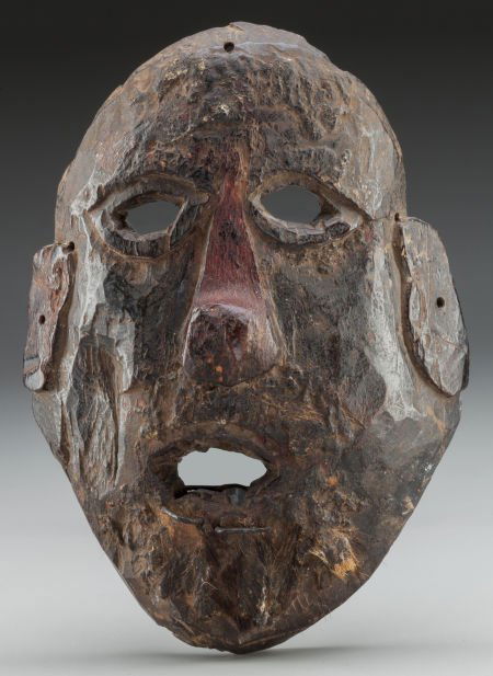 Mask, Nepal   mask of a joker, his expression is (1 of 2)