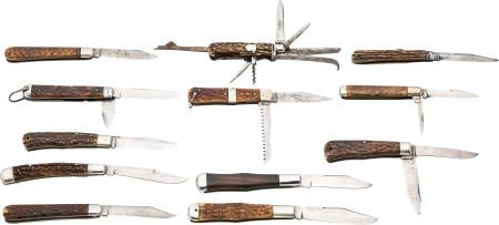 Traveling Leather Case of Knives. 12 stag folde: Traveling Leather Case of Knives. 12 stag folders from various makers including Camillus a