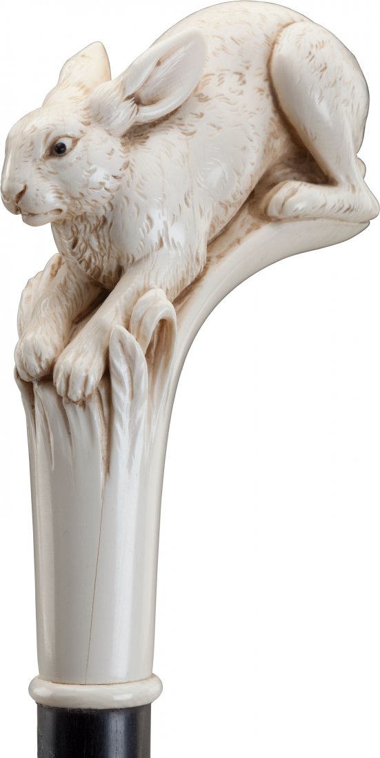65196: A Carved Ivory and Ebonized Wood Rabbit Cane, la