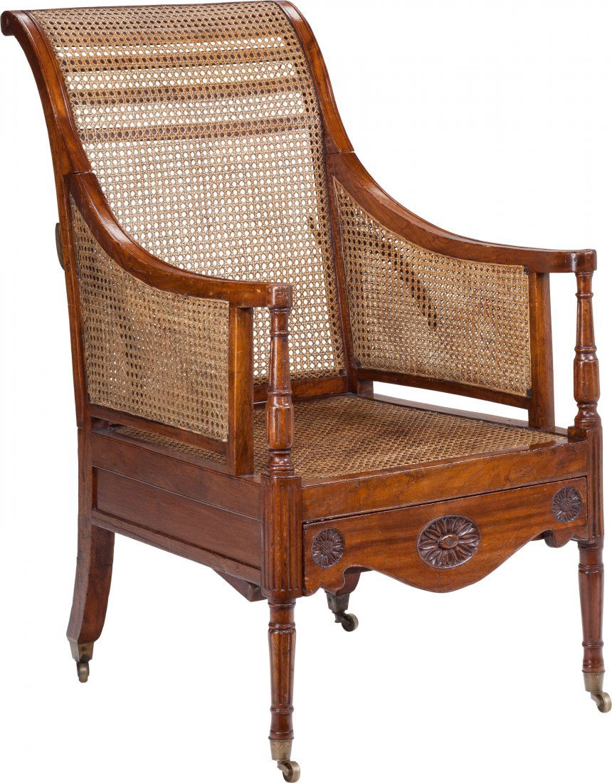 A George III Colonial Caned Convertible Armchair: A George III Colonial Caned Convertible Armchair, circa 182042-1/2 inches high x 24 i