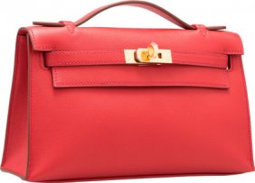 56132: Hermes Ebene Swift Leather Kelly Longue Clutch B : Lot 56132  