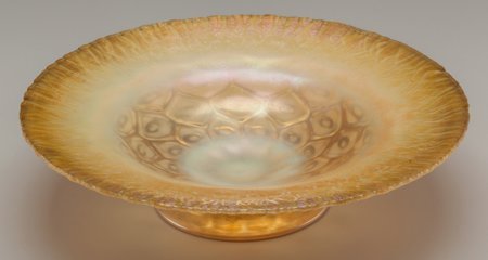 A Tiffany Studios Quilted Gold Favrile Glass Foo: A Tiffany Studios Quilted Gold Favrile Glass Footed Bowl, Corona, New York, circa 1910