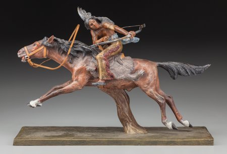 A Cold Painted Bronze Figural Group after Carl K: A Cold Painted Bronze Figural Group after Carl Kauba: Native American on Horseback<