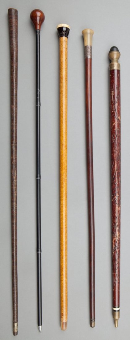 Five Various Canes Including Pool Cue, Lighter,: Five Various Canes Including Pool Cue, Lighter, Spear, early 20th c