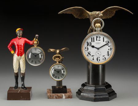 Three Figural Desk Clocks: Jockey and Eagles, ci: Three Figural Desk Clocks: Jockey and Eagles, circa 1920-1960Marks to clock faces: TIFF