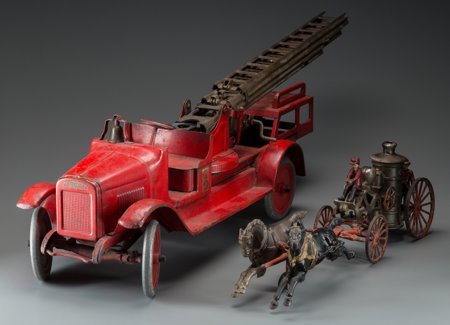 A Buddy L Aerial Fire Truck and Cast Iron Fire W: A Buddy L Aerial Fire Truck and Cast Iron Fire Wagon