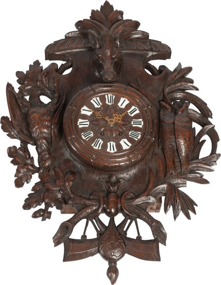 A Black Forest Carved Figural Wall Clock 32 h x : A Black Forest Carved Figural Wall Clock 32 h x 23 w inches (81.3 x 58.4 cm)
