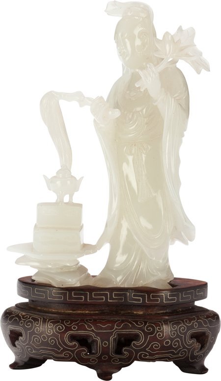 A Chinese Carved Jade Shoulao Figure with Stand,: A Chinese Carved Jade Shoulao Figure with Stand, 20th century 3-3/4 inches high (9.5 c