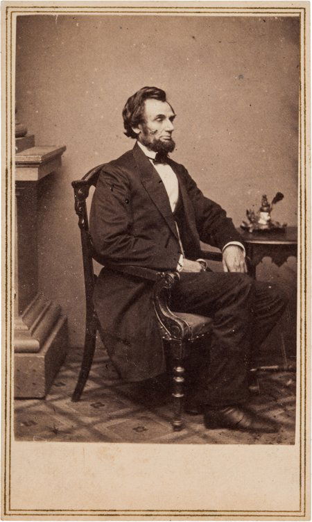 Abraham Lincoln: Inkwell Pose Carte-de-Visite. V: Abraham Lincoln: Inkwell Pose Carte-de-Visite. Very fine example of O-49, taken by Alexan