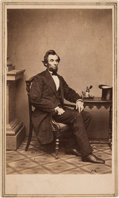 Abraham Lincoln: Inkwell Pose Carte-de-Visite. S: Abraham Lincoln: Inkwell Pose Carte-de-Visite. Superb example of O-51, taken by Alexander