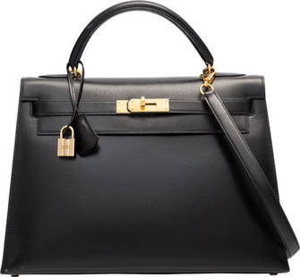 Lot - Hermes Kelly Sellier Handbag, c. 1987, in natural black box calf  leather with gold hardware, opening to a matching leather lined int