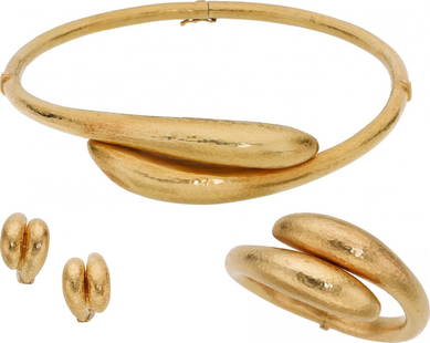 Gold Jewelry Suite, Lalaounis The suite includes an 18: Gold Jewelry Suite, Lalaounis The suite includes an 18k gold hinged necklace, bangle, and earrings, marked Ilias Lalaounis. Total weight 141.30 grams.Necklace Dimensions: 14-1/2 inches x 1 inchBangle