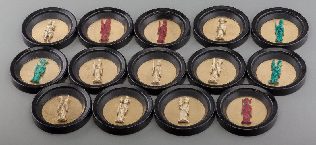 Fourteen Chinese Figural Coasters Depicting Various Dei: Fourteen Chinese Figural Coasters Depicting Various Deities, 20th century3-1/2 inches diameter (8.9 cm)The coasters housing carved deities behind glass including Chung-Li Ch'uan (symbol of prosperity)