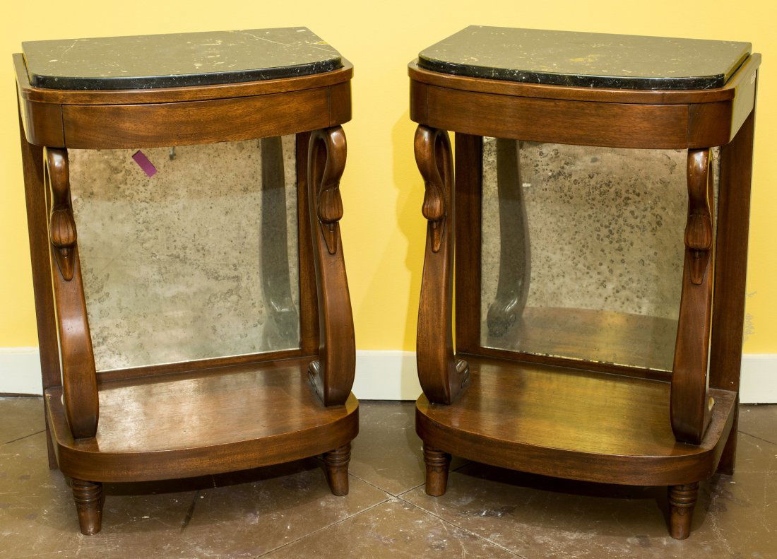 A Diminutive Pair of Empire-Style Carved Mahogany Pier: A Diminutive Pair of Empire-Style Carved Mahogany Pier Tables, early 20th century29 h x 20 w x 13-1/2 d inches (73.7 x 50.8 x 34.3 cm) Each with black marble top, one with a frieze drawer.