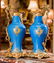 A Pair of Sevres Celeste Bleu Enameled Porcelain Ewers