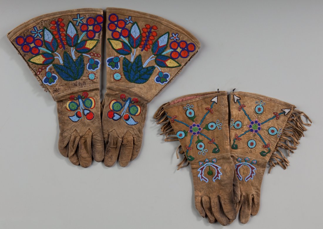 Two Pairs of Plateau Beaded Hide Gauntlets c. 1900 hi: Two Pairs of Plateau Beaded Hide Gauntlets c. 1900 hide, glass seed beads, cotton cloth, thread Provenance: Property from the Estate of Roy Raley, First President of the Pendleton Roundup Lengths: 13 