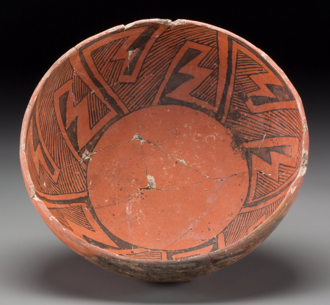 A Pinedale Black-On-Red Bowl c. 1100 - 1250 AD clay,: A Pinedale Black-On-Red Bowl c. 1100 - 1250 AD clay, paint Provenance: Property from the Collection of Dr. Gerald and Mrs. Laurette Maisel Diameter: 9 ¾ inches
